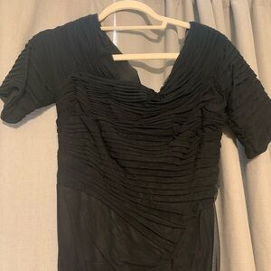 Tadashi Shoji asymmetrical off the shoulder black dress.  size is petite large